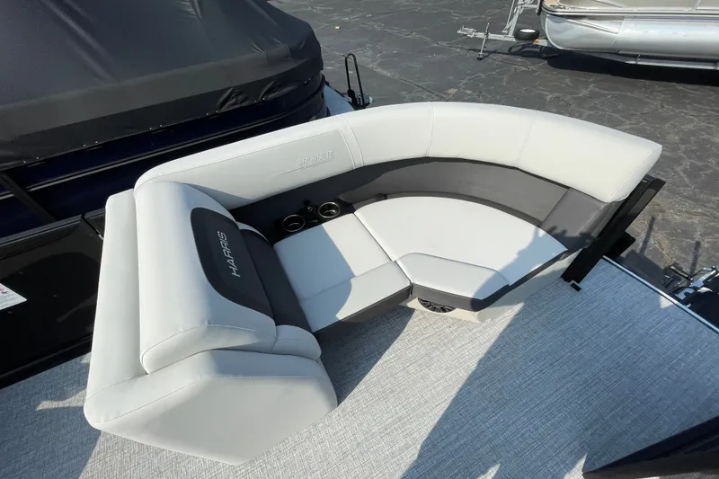 Slide: The Image of Luxurious seating on 2026 Harris Cruiser 210 SLDH pontoon boat, featuring sleek design and comfort. - 9