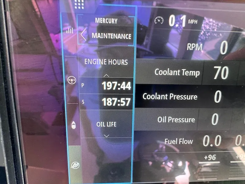 Slide: The Image of A digital display shows maintenance info, engine data, and operating hours for a Tiara Yachts 43 LE boat. - 43