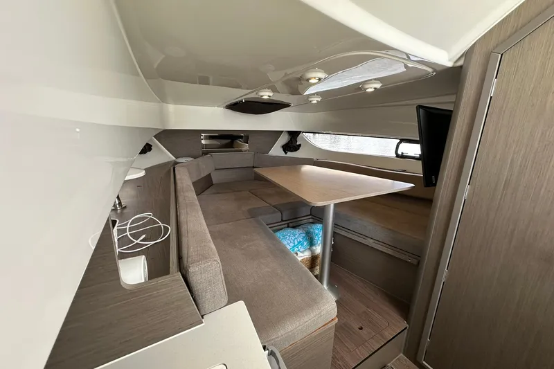Slide: The Image of Interior of 2024 Beneteau Flyer 9 SUNdeck, featuring cozy seating and modern design. - 31