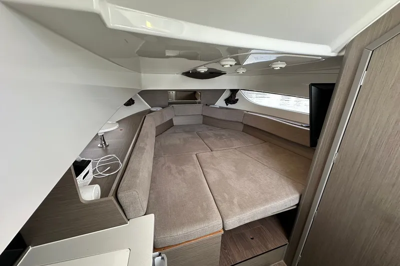 Slide: The Image of 2024 Beneteau Flyer 9 SUNdeck interior cabin with spacious seating and modern design. - 24
