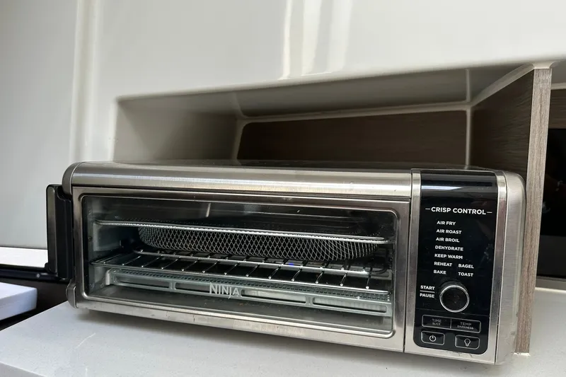Slide: The Image of Ninja toaster oven with multiple functions on Beneteau Flyer 9 SUNdeck 2024 boat. - 22