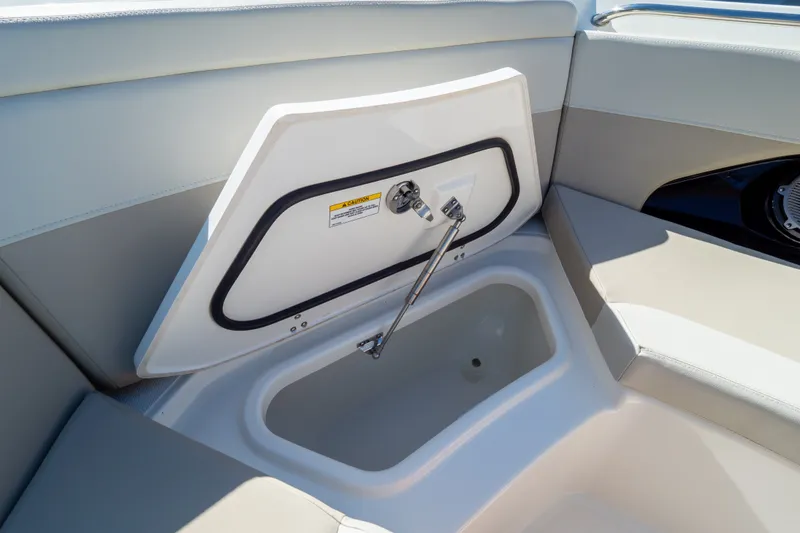 Slide: The Image of 2023 Boston Whaler 280 Vantage boat storage compartment with open hatch. - 93