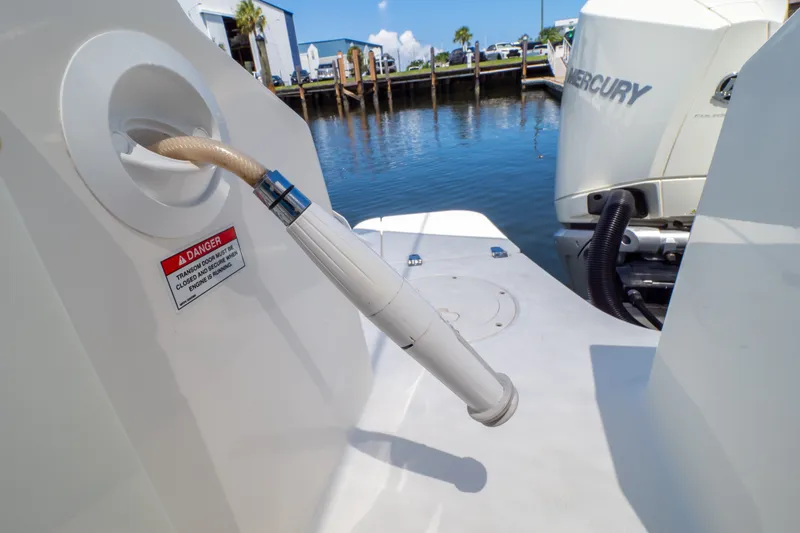 Slide: The Image of Boston Whaler 280 Vantage 2023 boat with Mercury engine at dockside. - 35