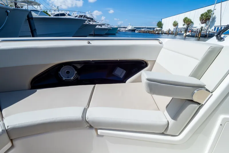 Slide: The Image of Interior seating of 2023 Boston Whaler 280 Vantage boat at marina. - 92