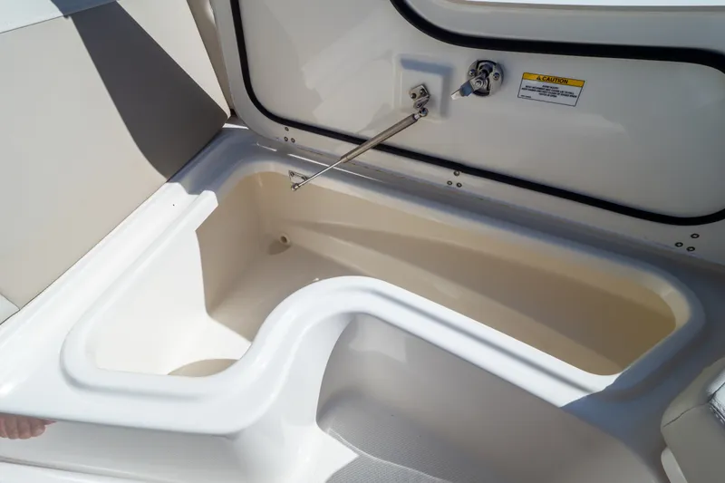 Slide: The Image of Storage compartment in 2023 Boston Whaler 280 Vantage boat, showcasing spacious interior design. - 94