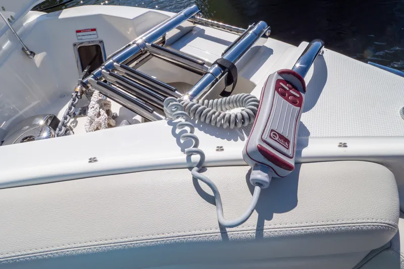 Slide: The Image of 2023 Boston Whaler 280 Vantage boat deck with ladder and control device. - 99