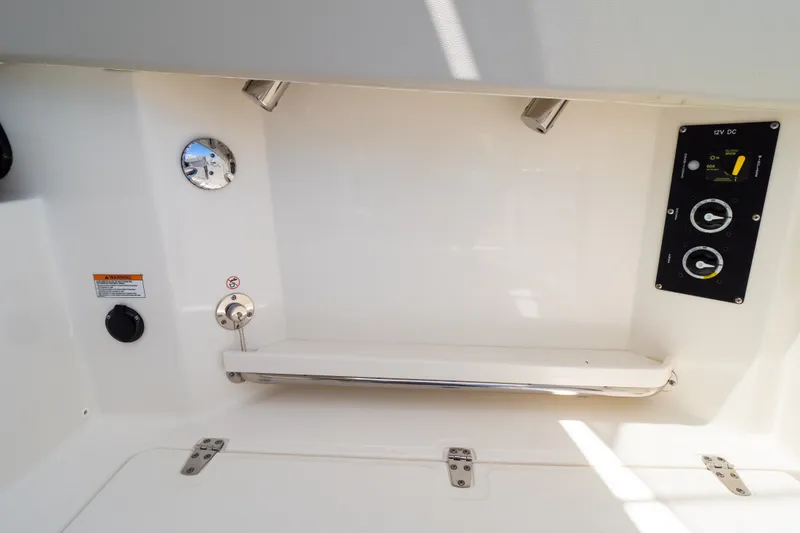 Slide: The Image of 2023 Boston Whaler 280 Vantage interior with control panel and gauge. - 47