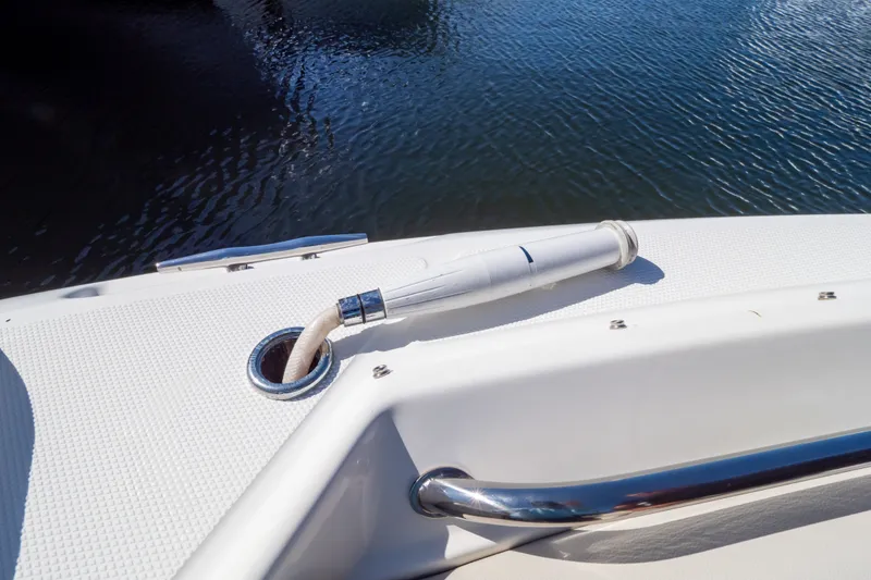 Slide: The Image of 2023 Boston Whaler 280 Vantage boat deck with water hose detail. - 96
