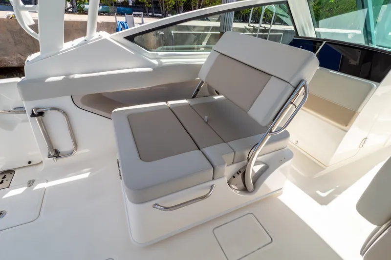 Slide: The Image of 2023 Boston Whaler 280 Vantage interior seating with sleek, modern design and comfortable upholstery. - 63
