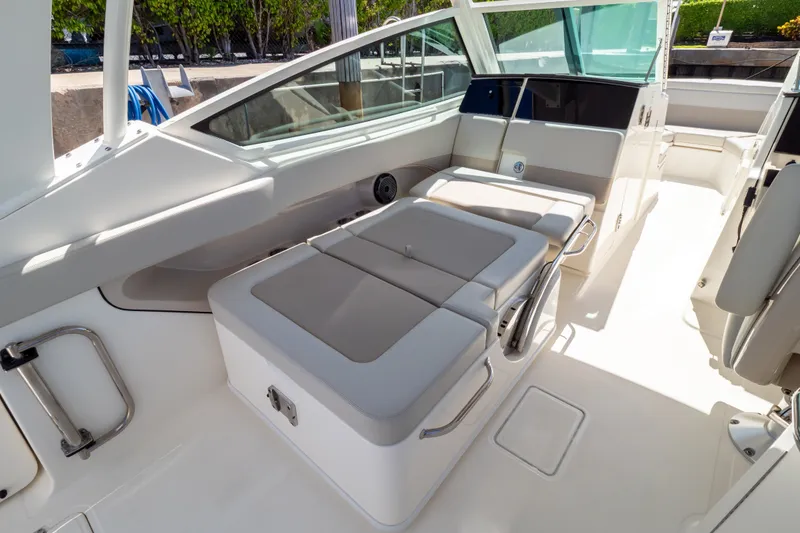 Slide: The Image of 2023 Boston Whaler 280 Vantage interior with seating and sleek design. - 61