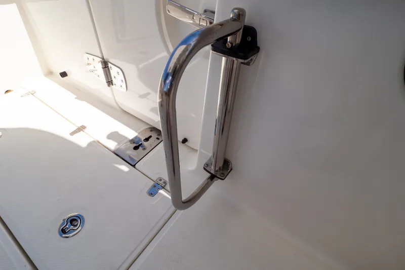 Slide: The Image of Stainless steel handle on 2023 Boston Whaler 280 Vantage boat deck. - 52