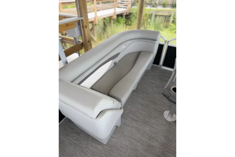 Slide: The Image of 2023 Bennington 22 SV boat interior with plush seating and modern design. - 19
