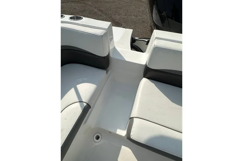 Slide: The Image of 2023 Hurricane SunDeck Sport 192 RL OB boat seating area with cup holders. - 19
