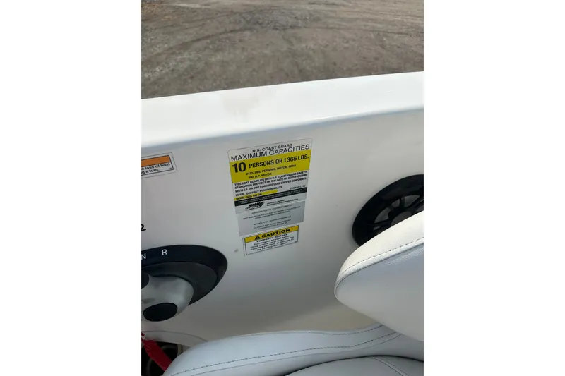 Slide: The Image of 2023 Hurricane SunDeck Sport 192 RL OB boat capacity label, seating for 10, 1365 lbs limit. - 28