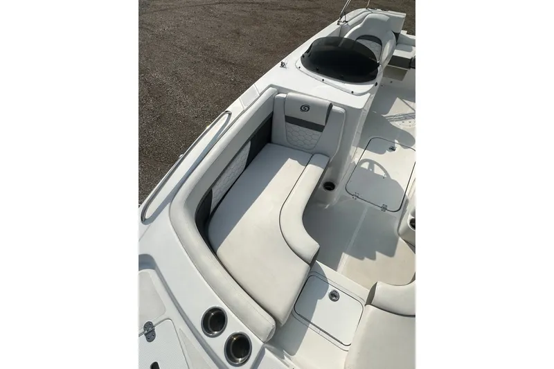 Slide: The Image of 2023 Hurricane SunDeck Sport 192 RL OB boat interior with white seating and cup holders. - 14