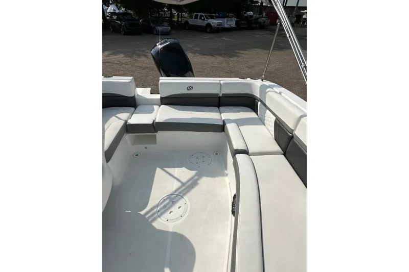 Slide: The Image of 2023 Hurricane SunDeck Sport 192 RL OB boat interior with spacious seating and modern design. - 16