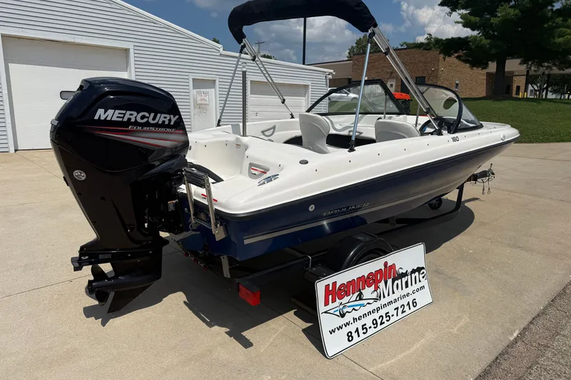 Slide: The Image of 2019 Bayliner 160 Bowrider with Mercury engine, displayed at Hennepin Marine dealership. - 7