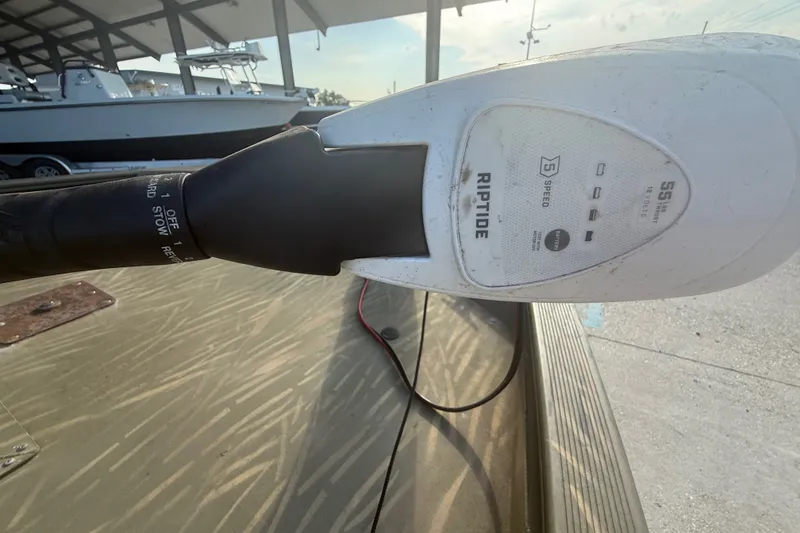 Slide: The Image of Trolling motor on 2019 Tracker Grizzly 1860 boat, featuring Riptide 55 lb thrust. - 15