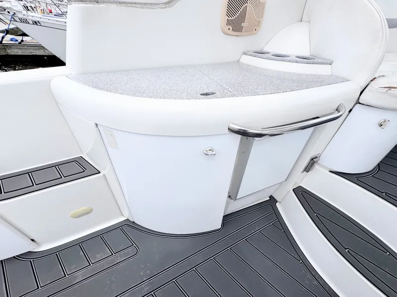 Slide: The Image of The image shows the cockpit of a 2004 Formula 40 Performance Cruiser with white upholstery and gray flooring. - 5