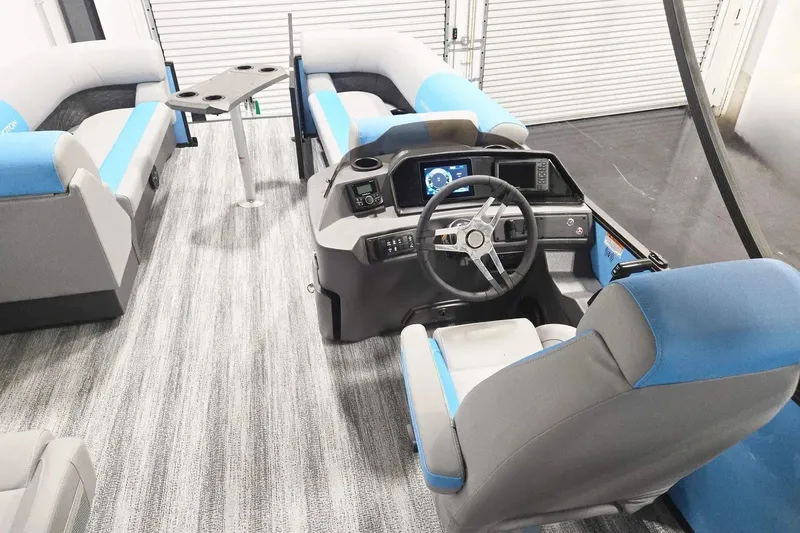 Slide: The Image of Interior of 2026 Bennington 23 S STERN RADIUS pontoon boat with modern helm and seating. - 6