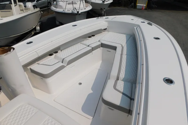 Slide: The Image of 2026 Regulator 31 boat with spacious seating and sleek design. - 7