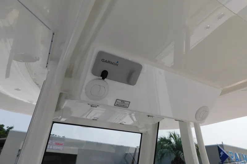 Slide: The Image of 2026 Regulator 31 boat interior with Garmin electronics and sleek design. - 36