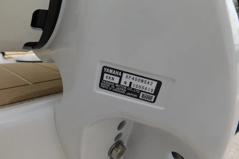 Slide: The Image of 2026 Regulator 31 boat with Yamaha motor label, model XF450NSA2. - 54