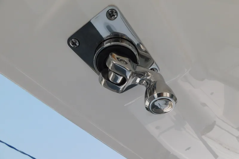 Slide: The Image of Chrome boat cleat on 2026 Regulator 31, mounted on a white surface. - 37