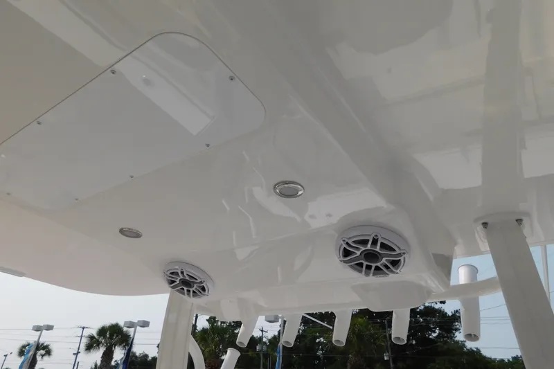 Slide: The Image of 2026 Regulator 31 boat ceiling with speakers and lighting fixtures. - 50