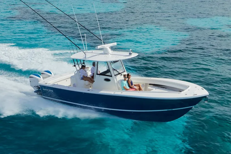 Slide: The Image of Manufacturer Provided Image: Regulator 31 boat 2026 cruising on turquoise waters. - 56