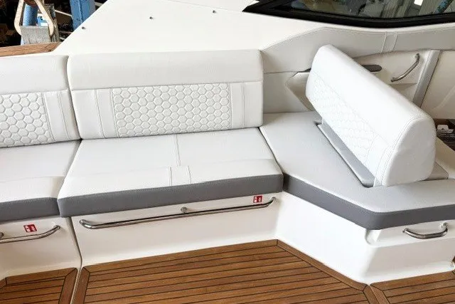 The Image of Luxurious seating on 2027 Sea Ray Sundancer 320 yacht with elegant white upholstery. - 3