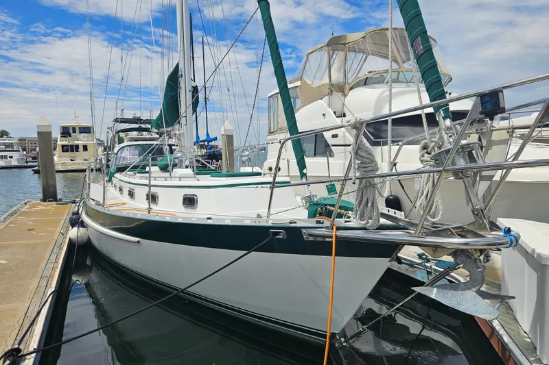 The Image of Sailboat Valiant 42, 1997 model, docked at marina under blue sky. - 0