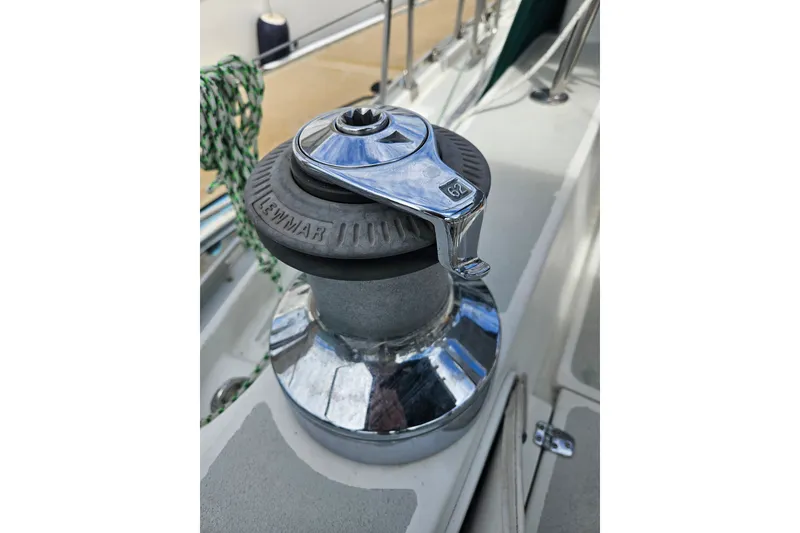 Slide: The Image of Close-up of a Lewmar winch on a 1997 Valiant 42 sailboat deck. - 18