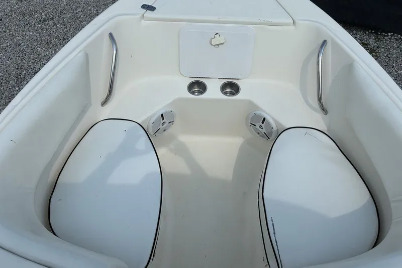 Slide: The Image of 2010 Scout 187 Dorado boat interior with seating and cup holders. - 4