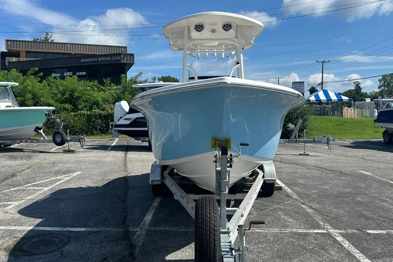 Slide: The Image of 2021 Sea Pro 219 Center Console boat on trailer in parking lot. - 4