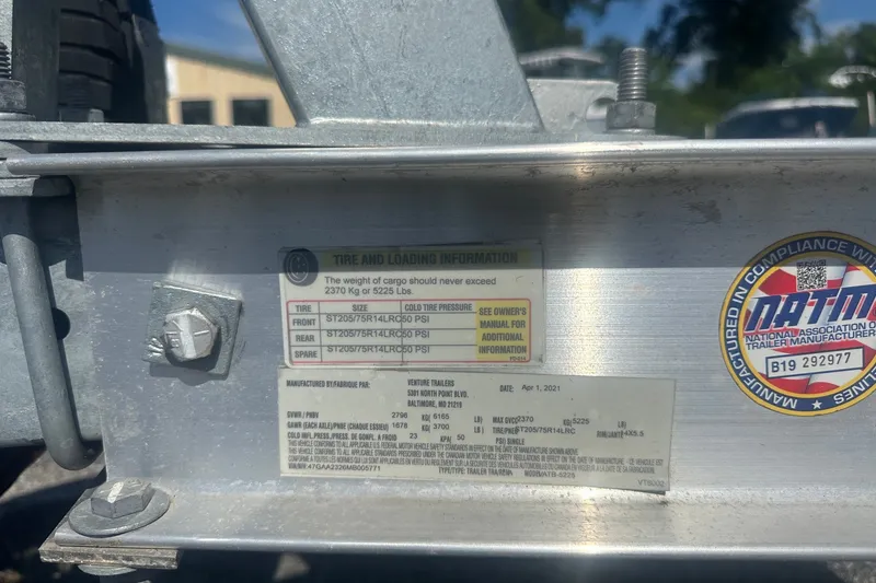 Slide: The Image of Tire and loading information label on a 2021 Sea Pro 219 Center Console trailer. - 6