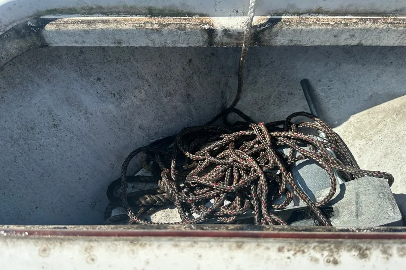 Slide: The Image of Rope and anchor in storage compartment of 2021 Sea Pro 219 Center Console boat. - 37