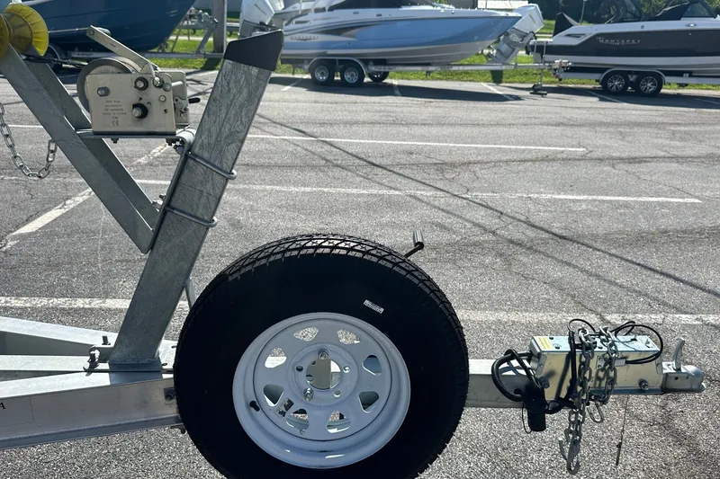 Slide: The Image of Trailer for 2021 Sea Pro 219 Center Console boat in parking lot. - 5
