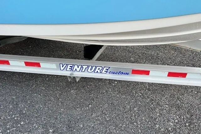 Slide: The Image of 2021 Sea Pro 219 Center Console boat on Venture custom trailer. - 9