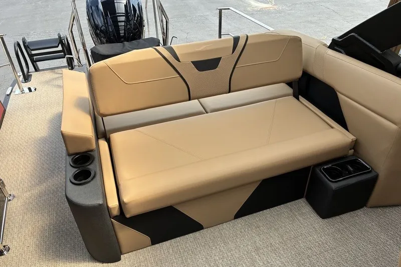 Slide: The Image of Luxurious tan seating on 2027 Evotti 723CS boat, featuring integrated cup holders and modern design. - 6