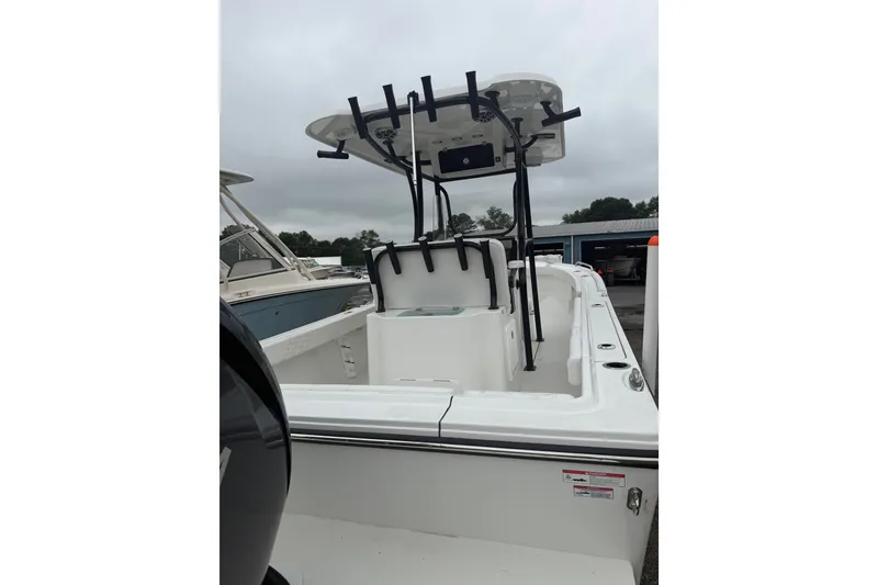 Slide: The Image of 2027 Parker 220 Coastal Elite boat with sleek design and modern features. - 5