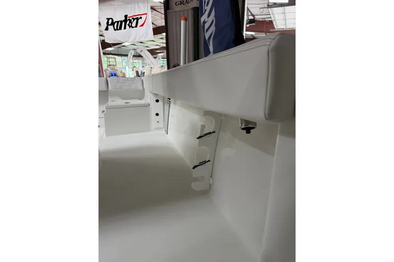 Slide: The Image of Interior view of 2027 Parker 220 Coastal Elite boat, showcasing seating and storage. - 20