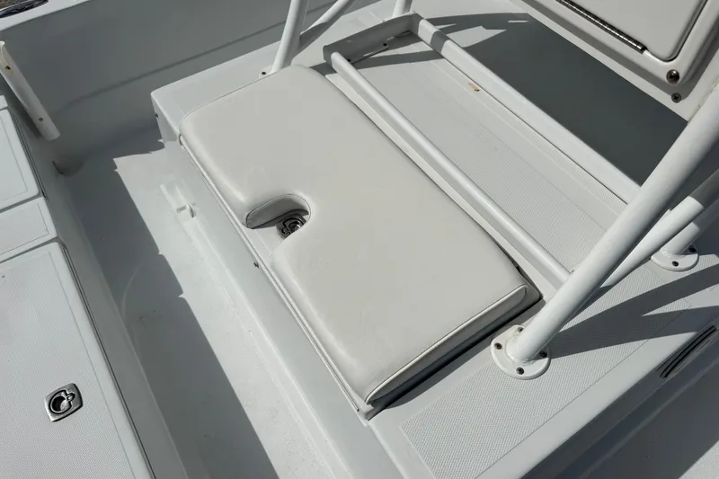 Slide: The Image of 2012 Shallow Sport 21 Modified V boat seat and deck detail. - 12