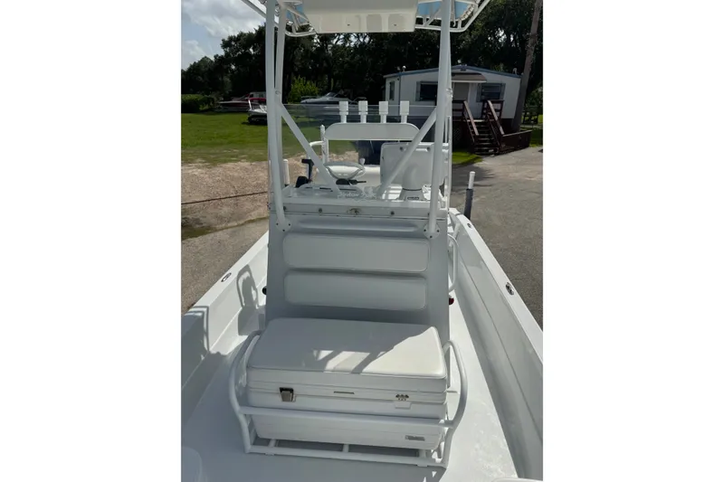 Slide: The Image of 2012 Shallow Sport 21 Modified V boat interior with seating and console. - 32