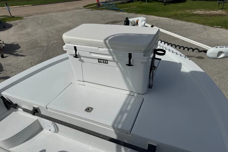 Slide: The Image of 2012 Shallow Sport 21 Modified V boat with Yeti cooler on deck. - 25