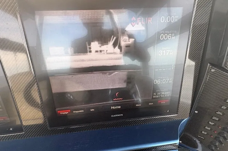 Slide: The Image of FLIR thermal imaging display on 2014 Nor-Tech 390 Sport boat dashboard. - 14