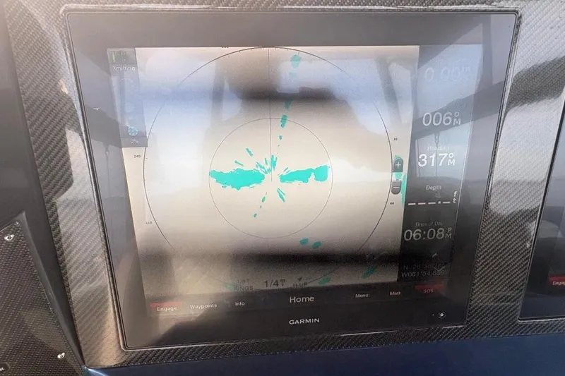 Slide: The Image of Garmin navigation display on 2014 Nor-Tech 390 Sport boat dashboard. - 12