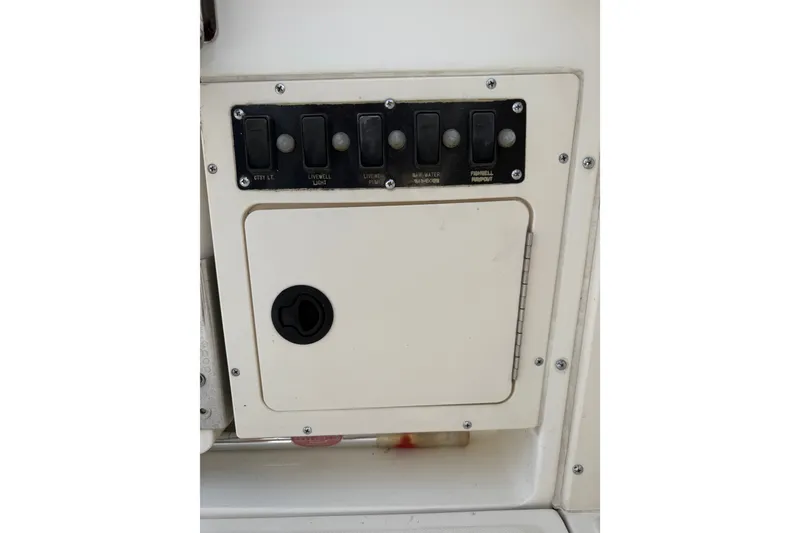 Slide: The Image of Control panel on a 2000 Boston Whaler 28 Conquest boat. - 6