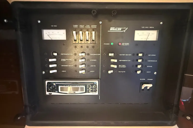 Slide: The Image of Electrical control panel of a 2000 Boston Whaler 28 Conquest boat. - 18
