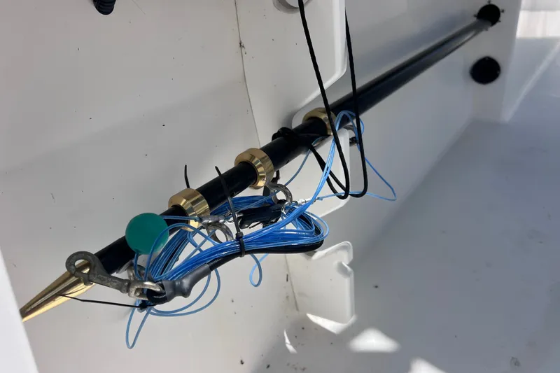 Slide: The Image of Fishing gear setup on a 2001 Cobia 254 Center Console boat. - 15